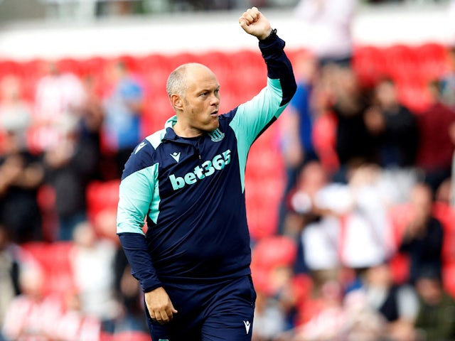 Stoke City manager Alex Neil celebrates after the match on August 19, 2023