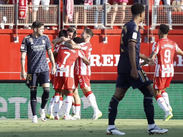 Almeria's Sergio Arribas celebrates scoring their first goal with teammates on August 19, 2023