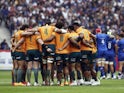 Australia players huddle before the match on August 27, 2023