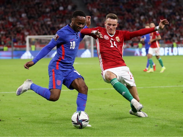 Hungary's Bendeguz Bolla in action with England's Raheem Sterling in September 2021