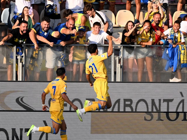 Frosinone's Abdou Harroui celebrates scoring their first goal with Jaime Baez on August 19, 2023