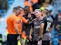 Fulham players remonstrate with referee Michael Oliver on September 2, 2023