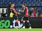 Genoa's Mateo Retegui celebrates scoring their first goal with Ruslan Malinovskyi on August 27, 2023