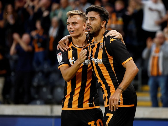 Hull City's Ozan Tufan celebrates scoring their first goal on August 25, 2023