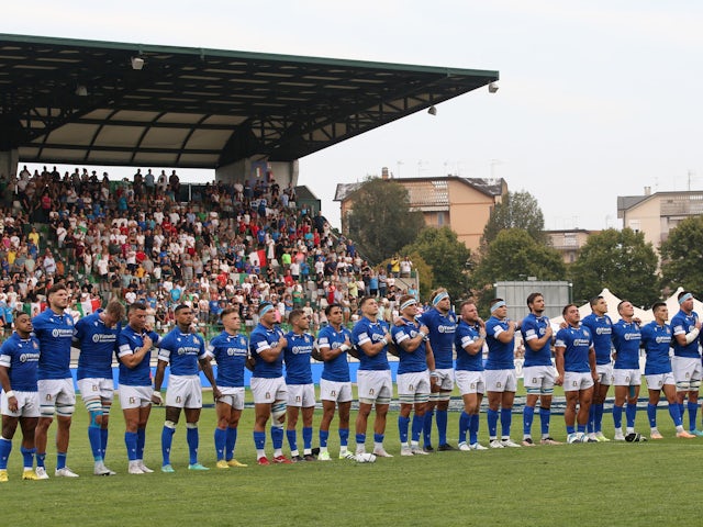 Italy Rugby players line up during the national anthems before the match on August 26, 2023