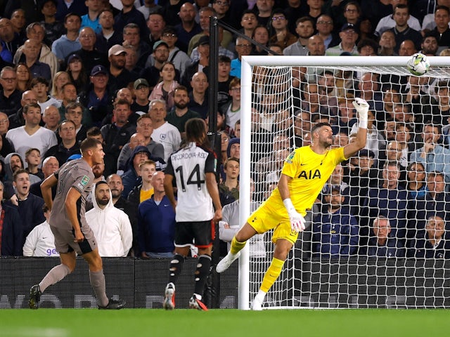 Tottenham Hotspur's Micky van de Ven scores an own goal past Fraser Forster and Fulham's first on August 29, 2023