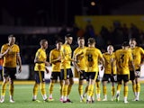 Newport County AFC's Bryn Morris looks dejected after missing a penalty during a penalty shootout on August 29, 2023