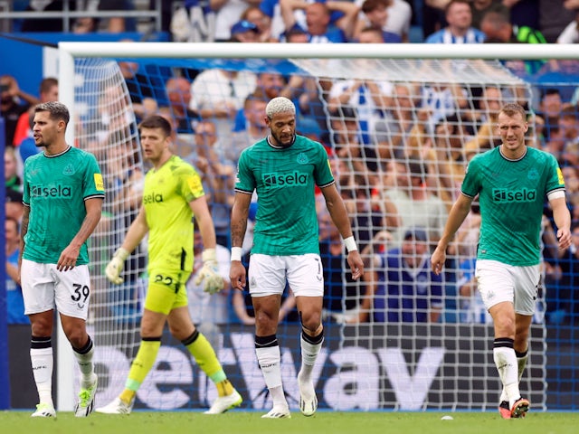 Newcastle United players look dejected after Evan Ferguson scores for Brighton & Hove Albion on September 2, 2023