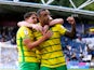Norwich City's Adam Idah celebrates scoring their fourth goal on August 26, 2023