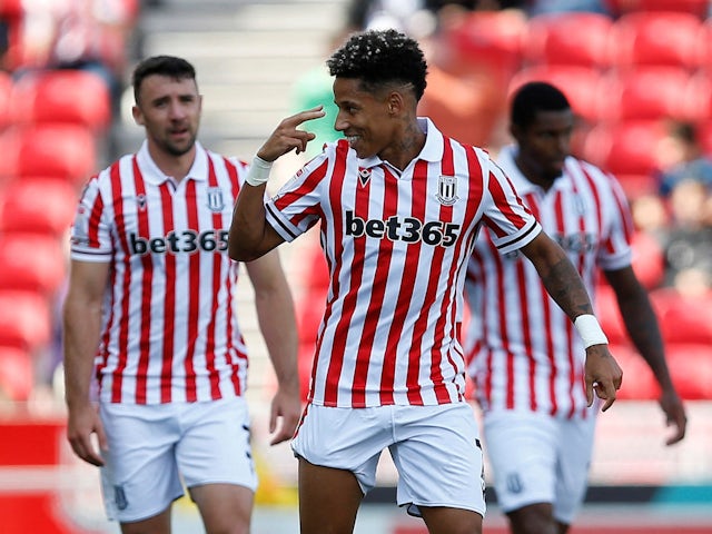 Stoke City's Andre Vidigal celebrates scoring their first goal with teammates on August 19, 2023