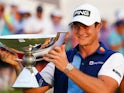 Viktor Hovland celebrates winning the Tour Championship and Fedex Cup on August 27, 2023.