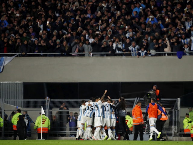 Argentina's Lionel Messi celebrates scoring their first goal with teammates on September 8, 2023
