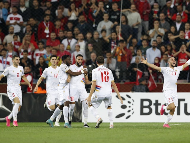 Armenia's Artak Dashyan celebrates scoring their first goal with teammates on September 8, 2023