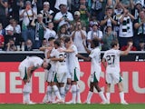 Borussia Monchengladbach's Ko Itakura celebrates scoring their first goal with teammates on September 2, 2023