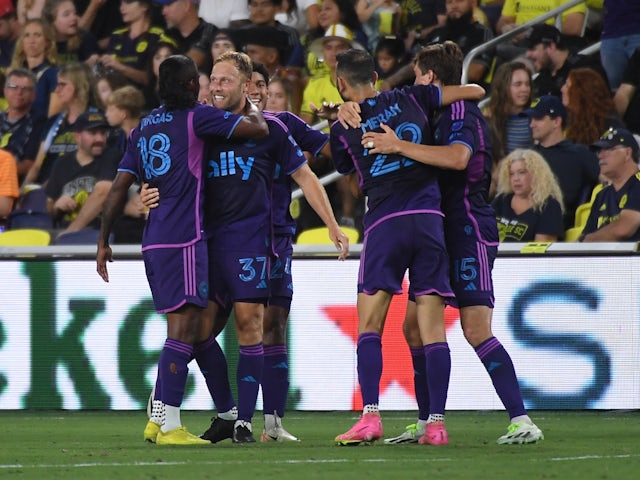 Charlotte FC midfielder Scott Arfield (37) celebrates with teammates after scoring a goal on September 3, 2023