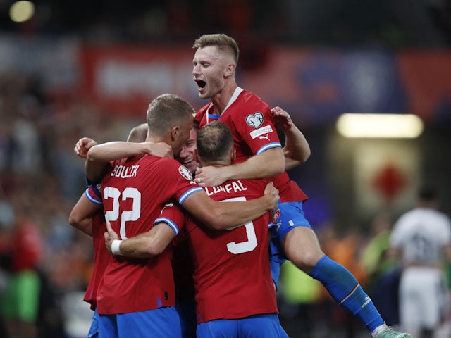 Czech Republic's Vaclav Cerny celebrates scoring their first goal with Jakub Brabec and teammates on September 7, 2023