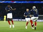 France's Marcus Thuram celebrates scoring their second goal with Antoine Griezmann on September 7, 2023