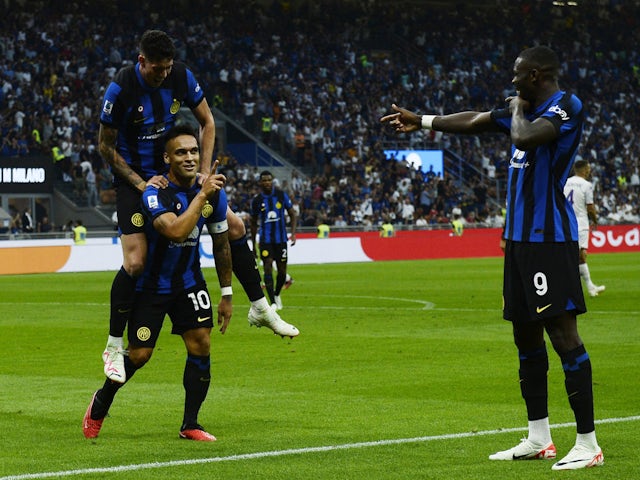 Inter Milan's Lautaro Martinez celebrates scoring their second goal with Alessandro Bastoni and Marcus Thuram on September 3, 2023
