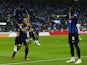 Inter Milan's Lautaro Martinez celebrates scoring their second goal with Alessandro Bastoni and Marcus Thuram on September 3, 2023