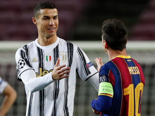 Juventus' Cristiano Ronaldo and Barcelona's Lionel Messi pictured in December 2020