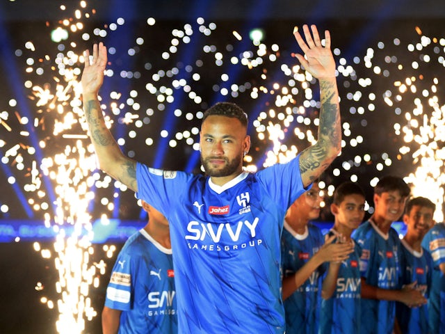 New signing Al-Hilal's Neymar is presented to the fans inside the stadium before the match on August 19, 2023