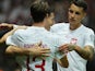 Poland's Robert Lewandowski celebrates scoring their second goal with teammates on September 7, 2023