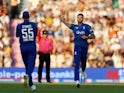 England bowler Reece Topley celebrates taking a wicket against New Zealand on September 10, 2023.
