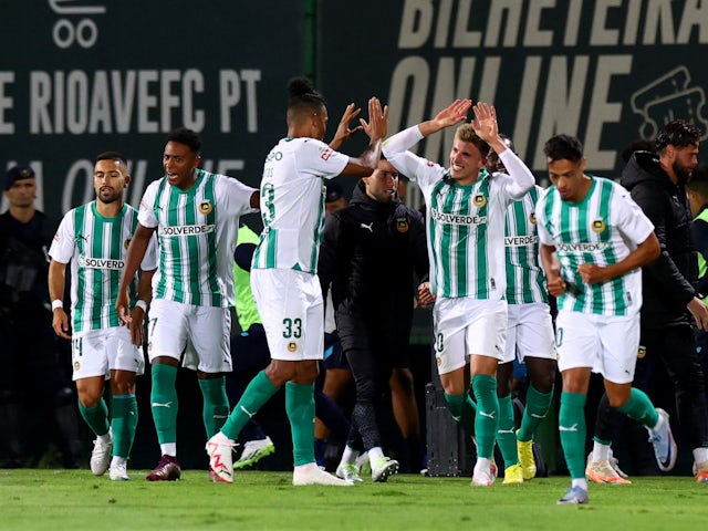 Rio Ave's Costinha celebrates scoring their first goal with teammates on August 28, 2023
