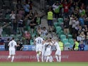 Slovenia's Benjamin Sesko celebrates scoring their third goal with teammates on September 7, 2023