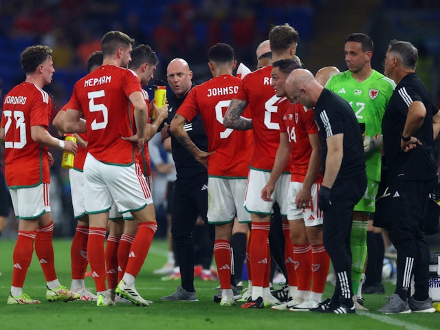 Wales manager Robert Page with players during a break in play on September 7, 2023