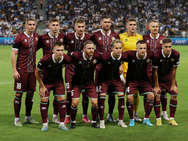 Belarus players pose for a team group photo before the match on September 12, 2023