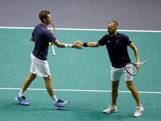 Britain's Daniel Evans and Neal Skupski during their match against Australia's Matthew Ebden and Max Purcell on September 13, 2023