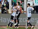 Argentina's Enzo Fernandez celebrates scoring their first goal with Julian Alvarez and teammates on September 12, 2023