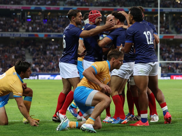France's Antoine Hastoy celebrates scoring their first try with teammates on September 14, 2023