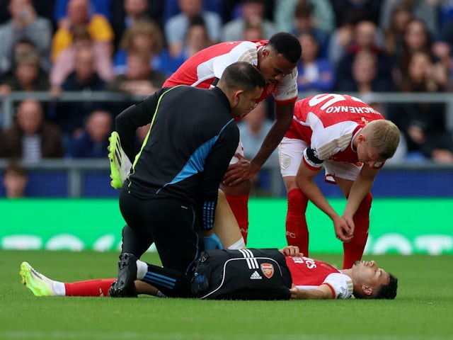 Arsenal's Gabriel Martinelli receives treatment for an injury on September 17, 2023