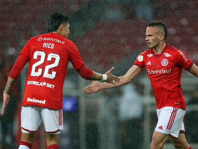 Internacional's Rene celebrates scoring their second goal with Internacional's Nicolas Hernandez on September 13, 2023