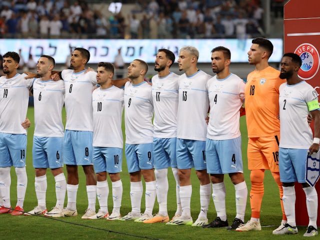 Israel players lined up before the match on September 12, 2023