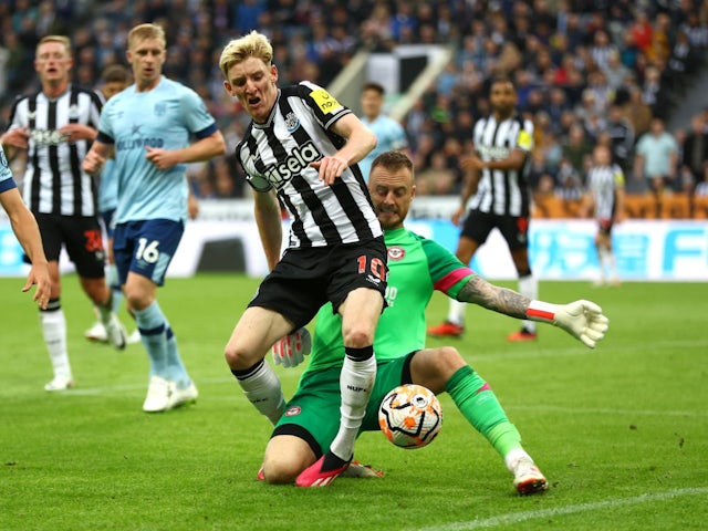 Brentford's Mark Flekken fouls Newcastle United's Anthony Gordon to concede a penalty on September 16, 2023