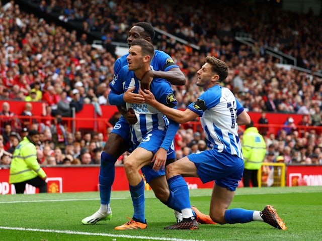 Brighton & Hove Albion's Pascal Gross celebrates scoring their second goal with Danny Welbeck and Adam Lallana on September 16, 2023