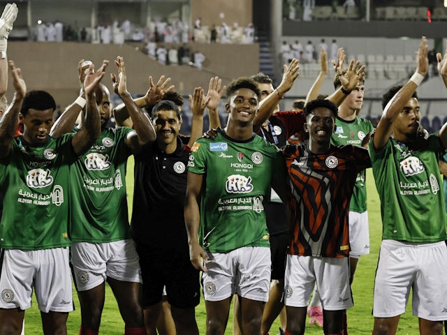 Al Ettifaq's Demarai Gray celebrates with teammates after the match on September 21, 2023