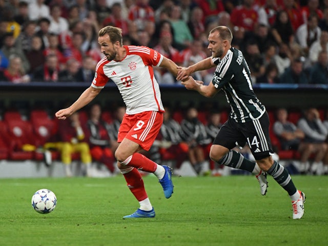 Bayern Munich's Harry Kane in action with Manchester United's Christian Eriksen on September 20, 2023