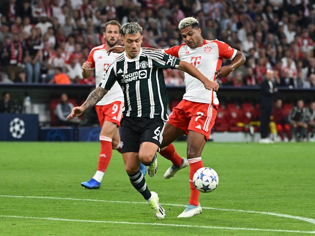Manchester United's Lisandro Martinez in action with Bayern Munich's Serge Gnabry on September 20, 2023