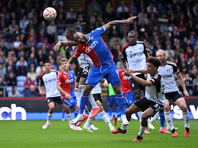 Fulham's Bobby De Cordova-Reid in action with Crystal Palace's Jordan Ayew on September 23, 2023