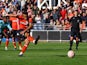 Luton Town's Carlton Morris scores their first goal from the penalty spot on September 23, 2023