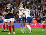England's Lucy Bronze celebrates scoring their first goal with Rachel Daly on September 22, 2023