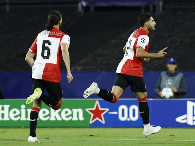 Feyenoord's Alireza Jahanbakhsh celebrates scoring their second goal on September 19, 2023