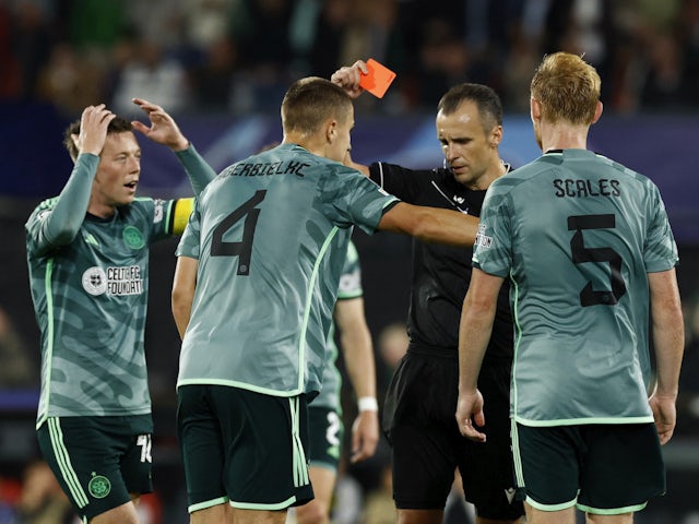 Celtic's Gustaf Lagerbielke is shown a red card by referee Irfan Peljto on September 19, 2023