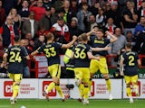 Newcastle United's Sven Botman celebrates scoring their third goal with teammates on September 24, 2023