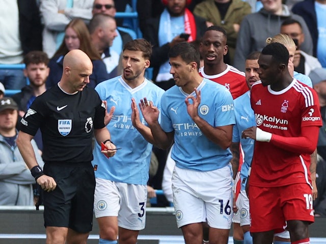Manchester City's Rodri reacts after being shown a red card by referee Anthony Taylor on September 23, 2023