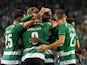 Sporting Lisbon's Ousmane Diomande celebrates scoring their third goal with teammates on September 17, 2023